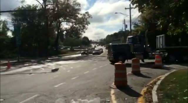 Truck taking left hand turn onto Boston Road