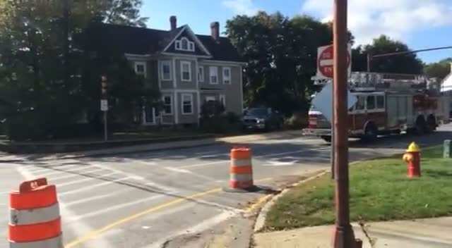 Fire truck takes left hand turn from center lane